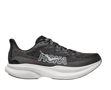 Black running shoe with white sole on a light gray background