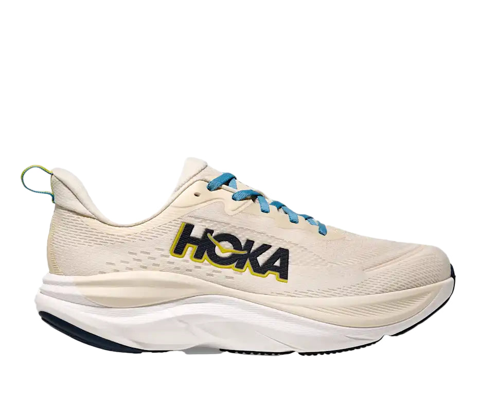 Beige running shoe with blue accents and 'Hoka' branding on a white background