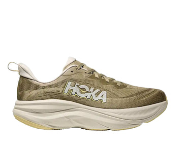 Brown running shoe with 'Hoka' branding on a white background