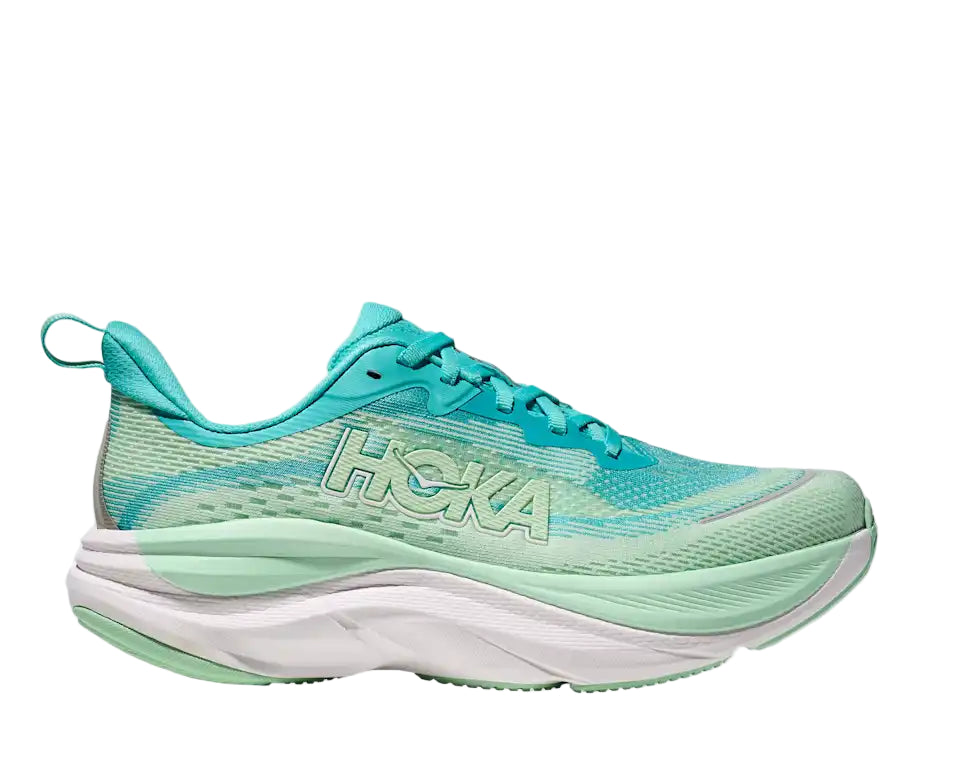 Green and blue running shoe with Hoka branding on a white background