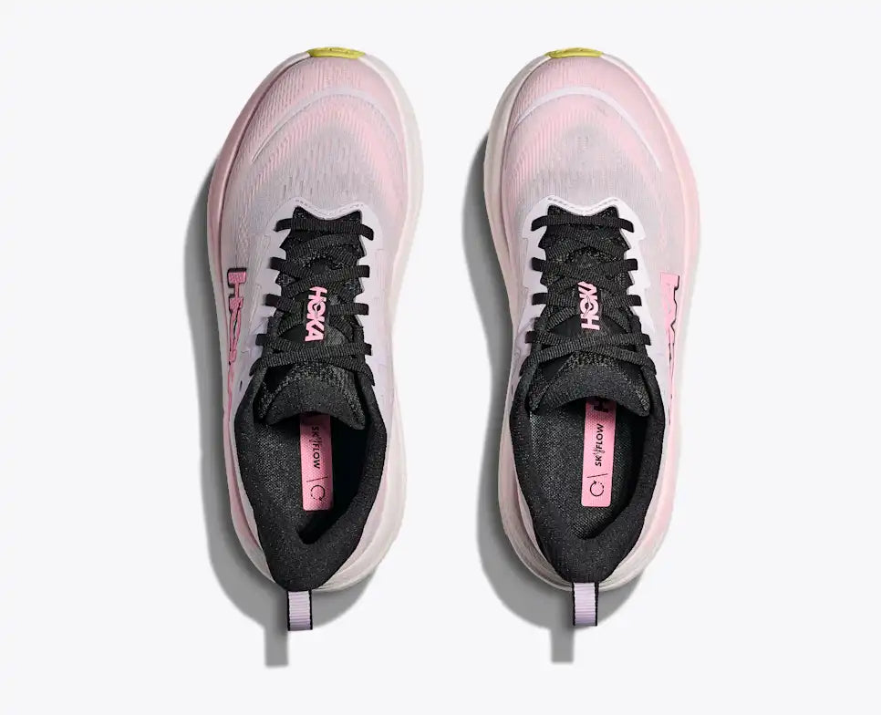Pink Hoka running shoe on a white background