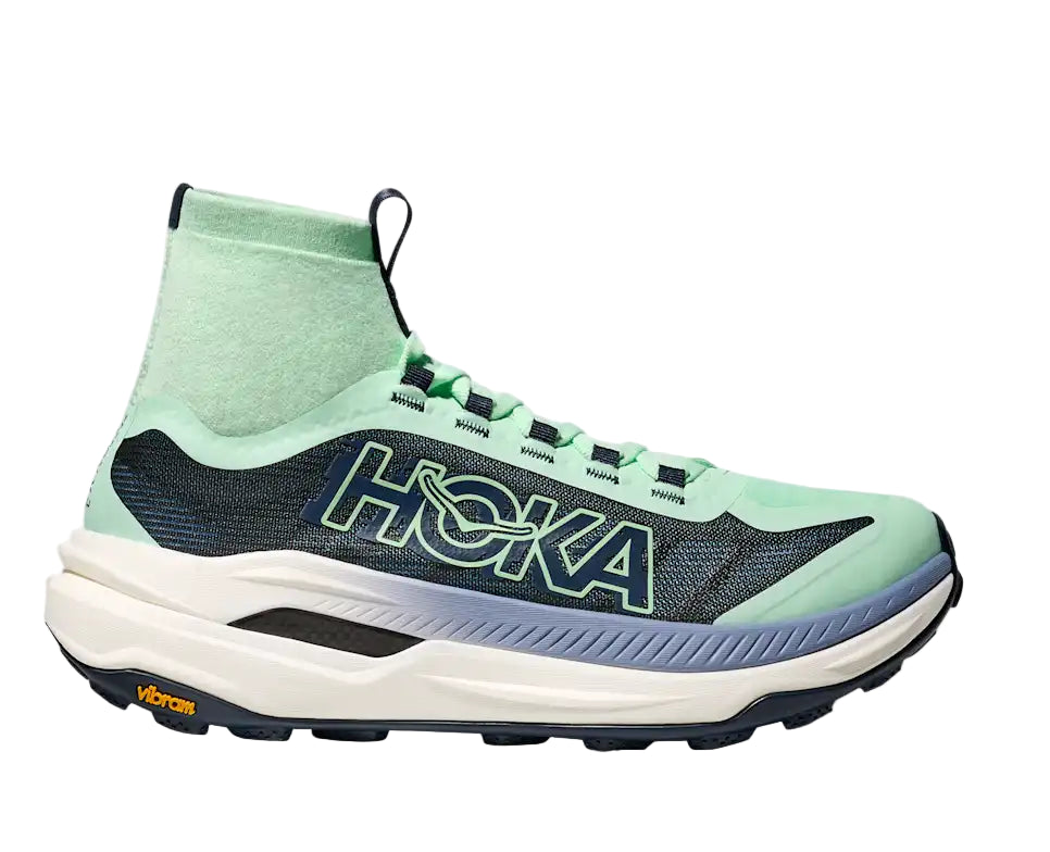 Green Hoka running shoe on a white background