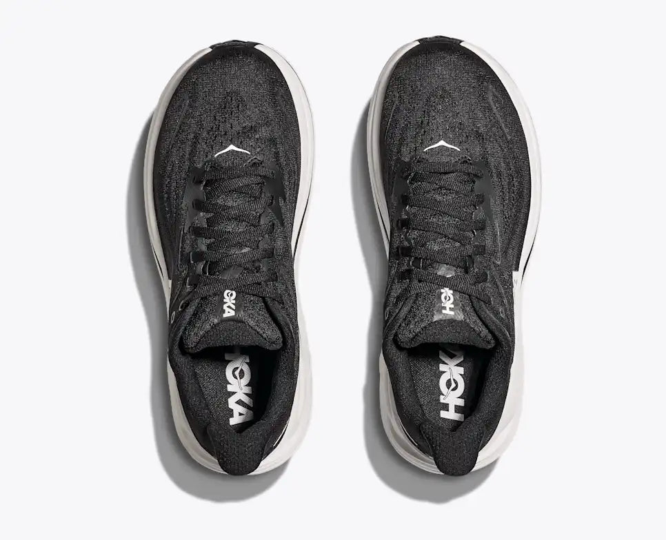 Black Hoka running shoe on a white background