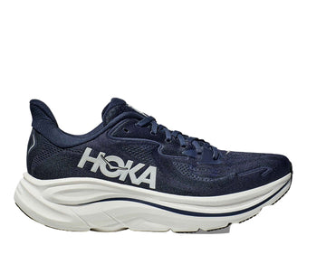 Navy running shoe with white sole on a white background