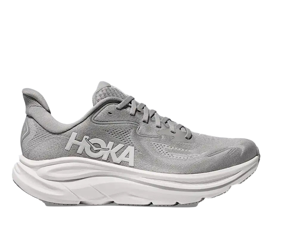 Gray running shoe with white sole on a white background