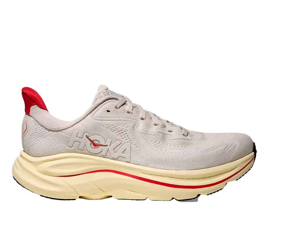 Gray running shoe with red accents on a white background