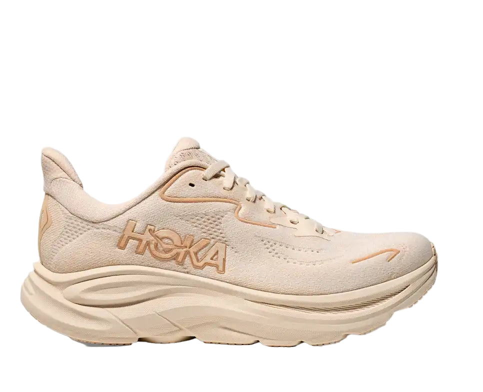 Beige running shoe with 'Hoka' branding on a white background