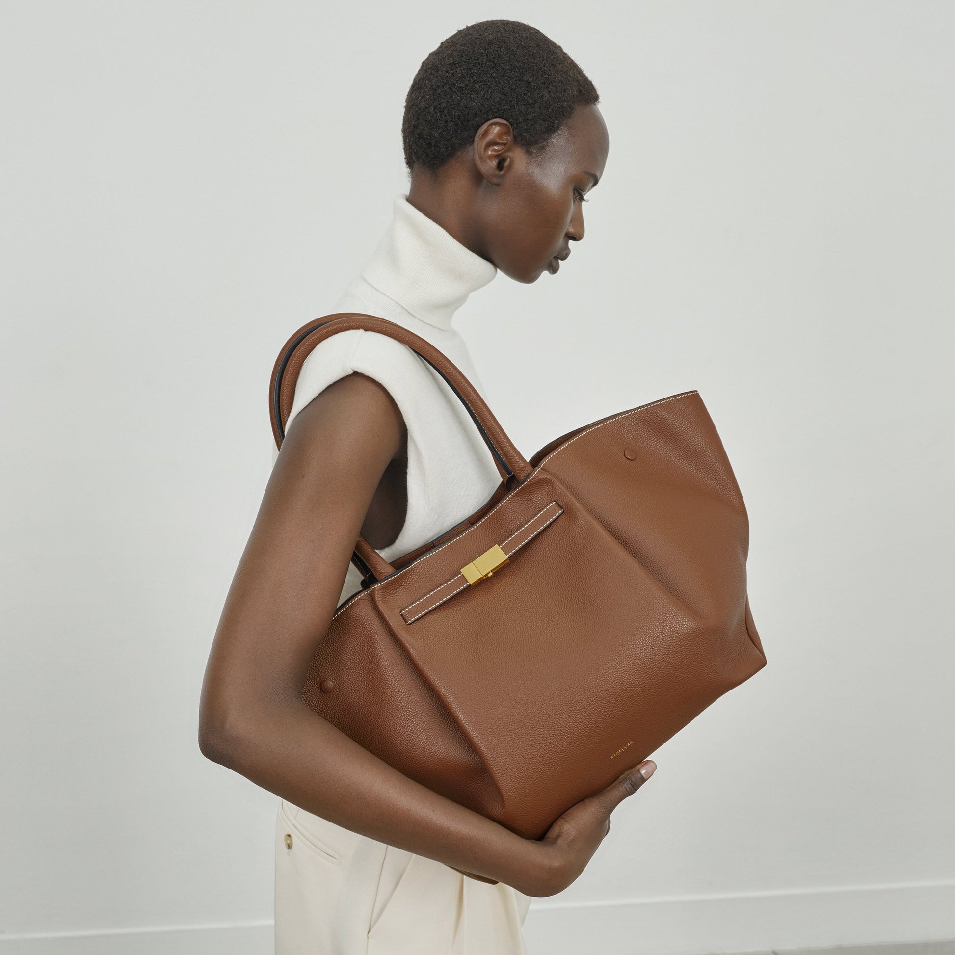 DeMellier The New York tan small grain ecru stitching