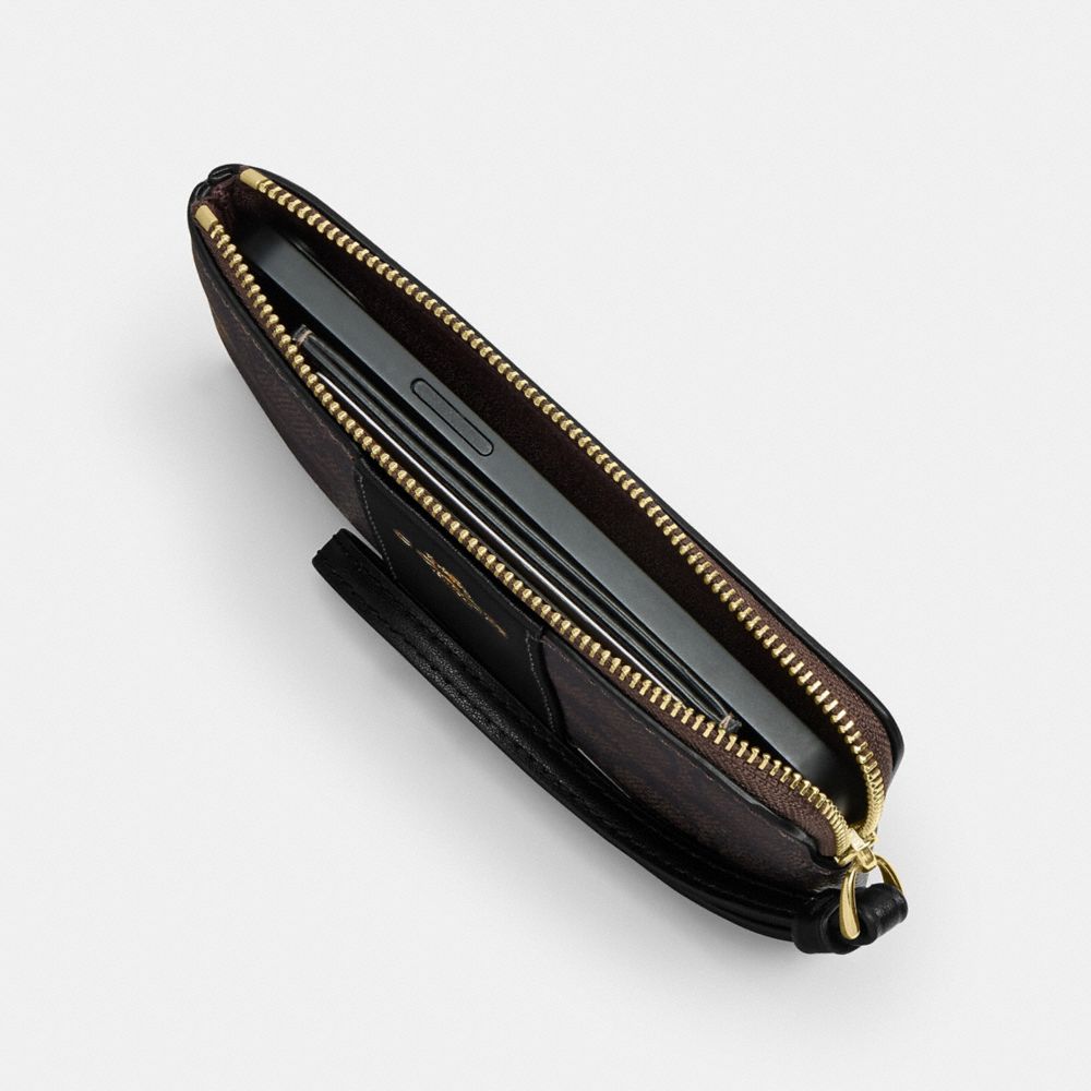Coach Corner Zip Wristlet In Signature Canvas With Stripe Gold