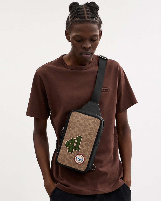 Sullivan Pack In Signature Canvas With Patches Signature Canvas-Gunmetal-Tan Multi Signature Canvas-Gunmetal-Tan Multi