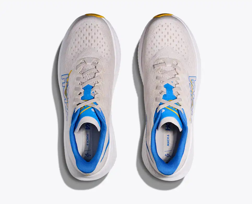 Hoka running shoe with blue and yellow accents on a white background