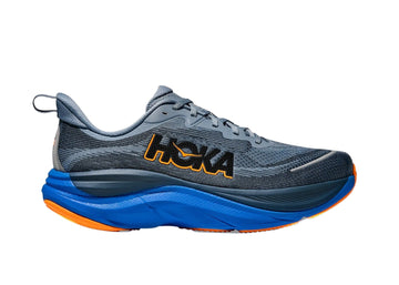 Gray running shoe with blue sole on a light gray background